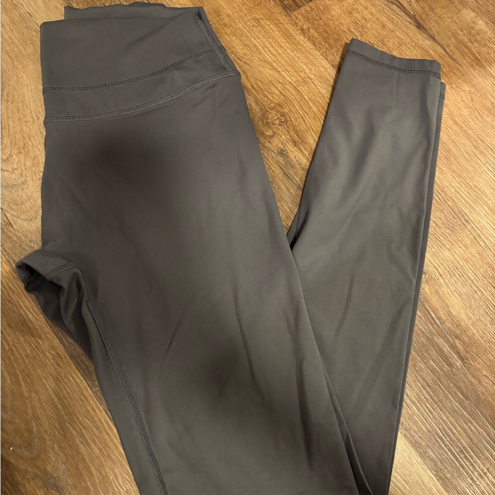 Oner active unified leggings in coal color size medium long length